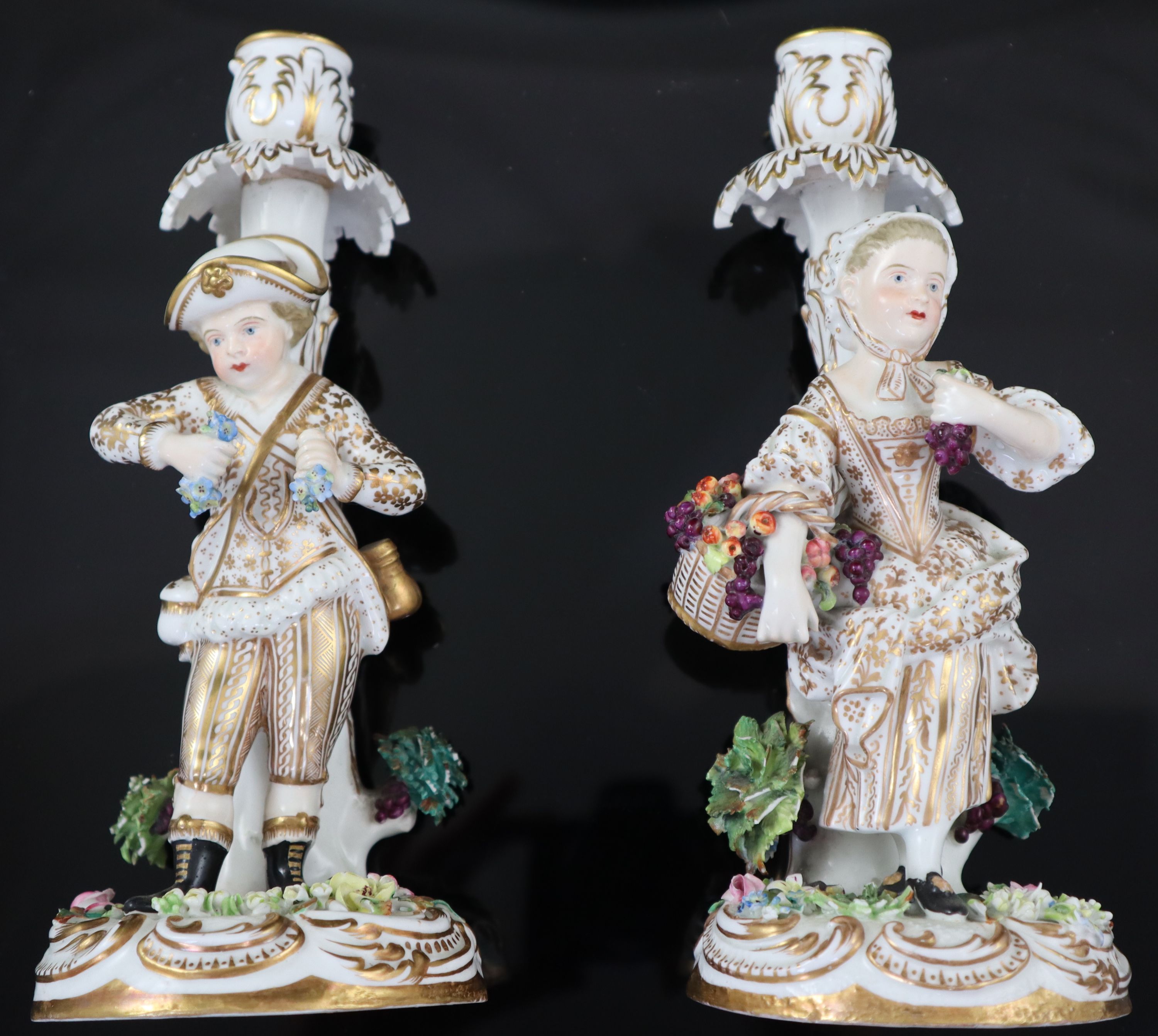 A pair of Victorian John Bevington bone china candlesticks, height 21.5cm